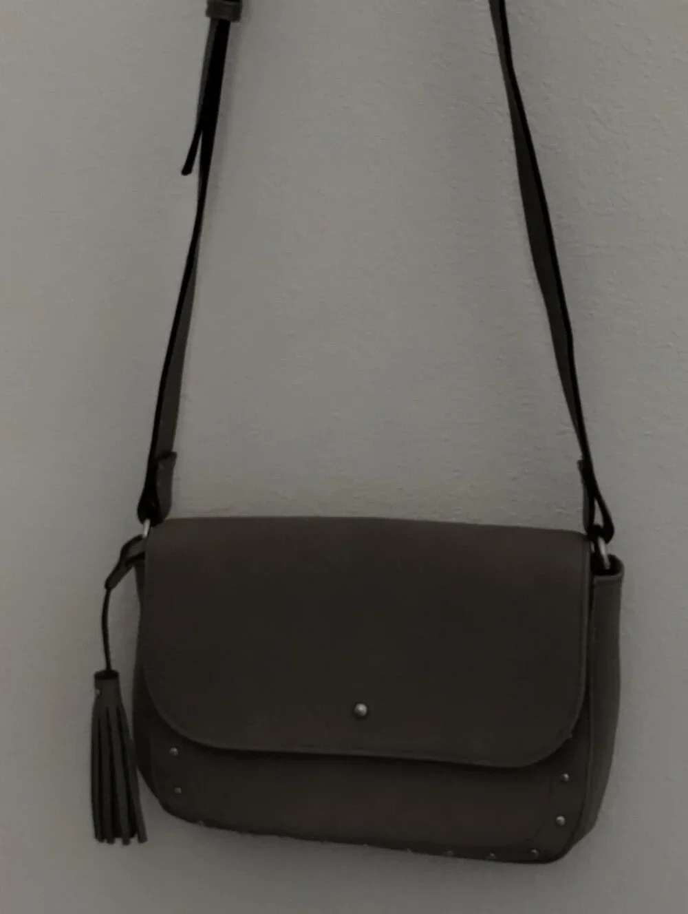 Classic Gray Crossbody Bag with Tassel Accent